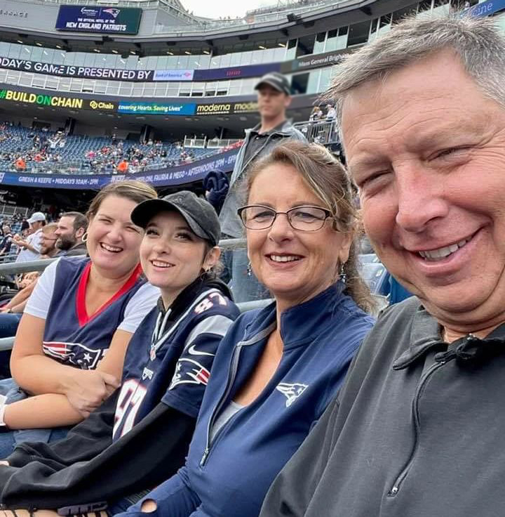 Jaclyn Zajac and her family attending a New England Patriots game