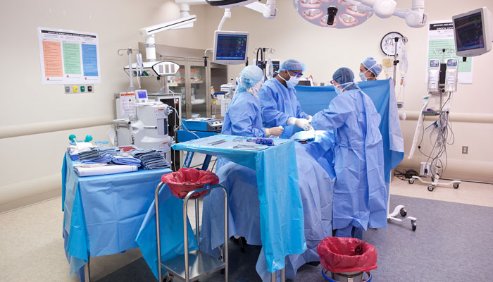 medical professionals in operating room during procedure