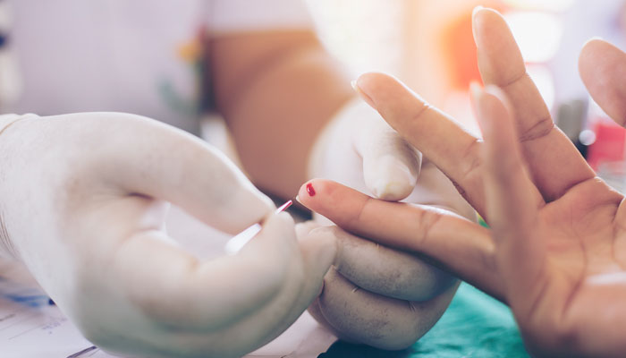 Closeup of a finger blood test