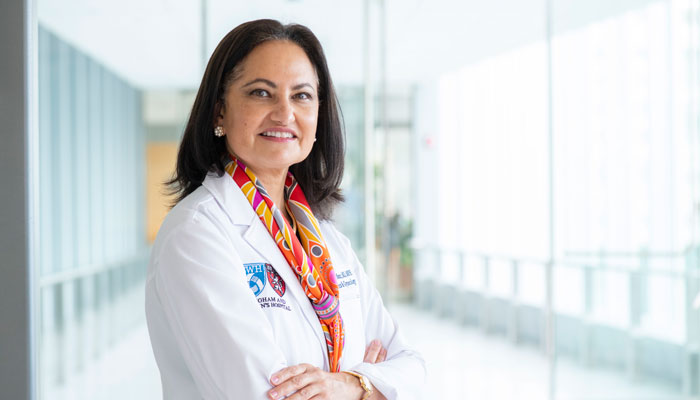 Illustration of people on boat traveling towards a lighthouse
