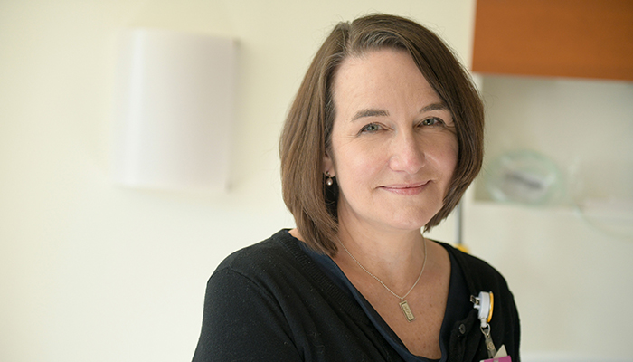 Illustration of people on boat traveling towards a lighthouse