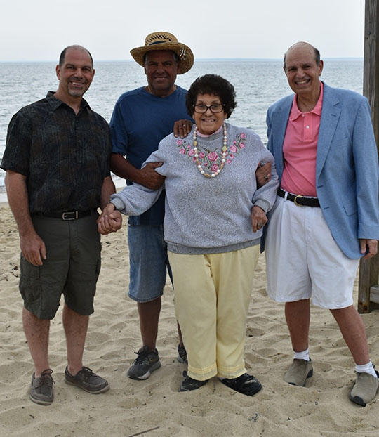 Joe Salvo with members of his family on a beach