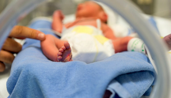 Newborn in Incubator