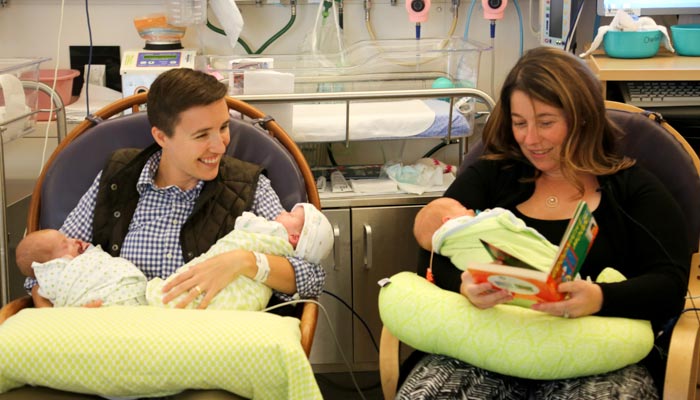 Reading at the bedside allows parents the opportunity to bond with their baby in the NICU.