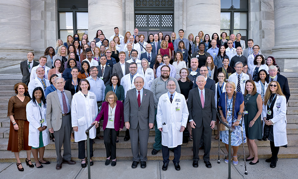 Members of the Psychiatry Department team in front of building